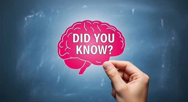 Hand holding pink brain shape with did you know text