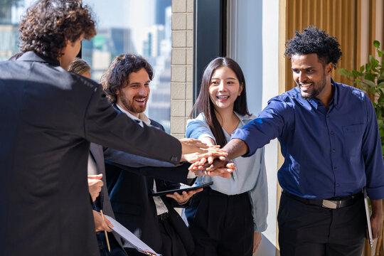 Team of diversity businessman entrepreneurs and startup have business meeting and encouraging each other for good energy to accomplish successful marketing plan