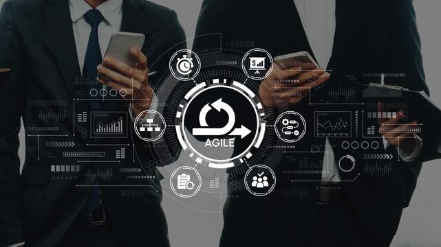 Business professionals engaged in agile project management with digital technology and data analysis on modern devices in a corporate environment. Entropy.