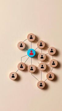 Network Connection: A conceptual image showcasing a network of interconnected wooden circles with human icons, centered around a distinct blue and red figure.