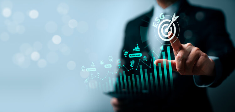 ESG business growth concept with professional touching virtual target and rising chart showing sustainable strategy, environmental goals, social responsibility and governance performance