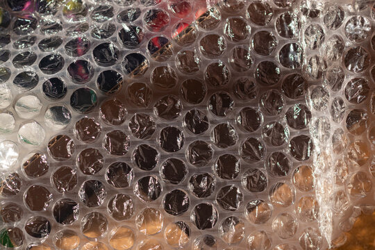 Macro texture of transparent plastic bubble wrap packaging material used for safe package shipping