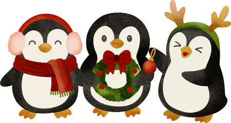Fototapeta premium Three cute cartoon penguins in festive Christmas attire one wearing earmuffs and scarf another holding a wreath and the third with reindeer antlers and holding an ornament.