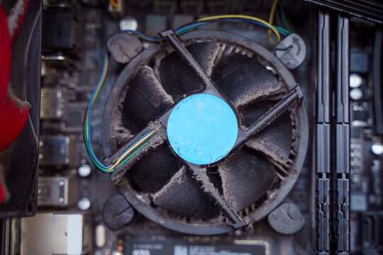 Dusty CPU cooling fan inside a desktop computer
