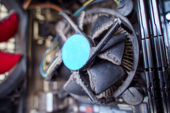Dusty CPU cooling fan inside a desktop computer