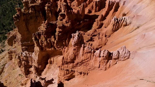 Aerial View of Red Rock Canyon Cliffs and Pine Forest in Utah