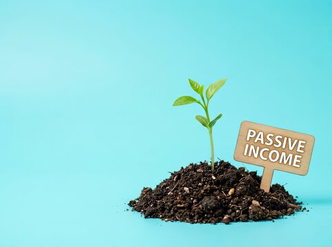 Small green plant growing in soil with a passive income sign ideal for financial blogs symbolizing wealth creation and investment growth