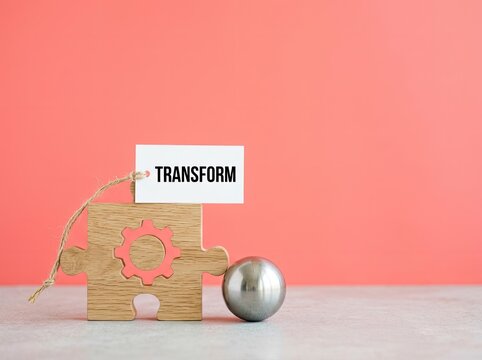 Wooden puzzle piece with transform tag perfect for business strategy visual content symbolizing corporate change and innovative development