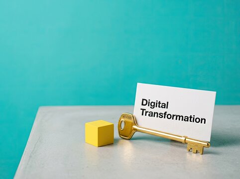Golden key holding card reading Digital Transformation suitable for business technology content symbolizing key solutions and tech success