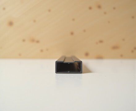 a small black object sitting on top of a white table