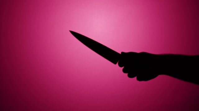 Dark Knife Silhouette In Hand With Horror Thriller Atmosphere