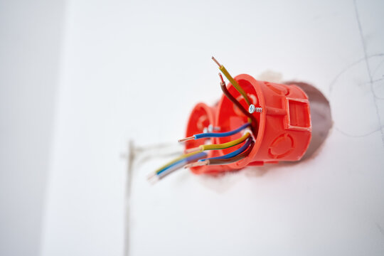Electrical boxes with exposed wires installed in wall