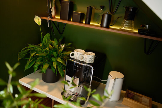 Home coffee corner with coffee machine and brewing tools