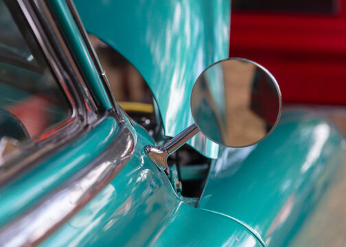 
Vintage and antiques car. Mirror.
