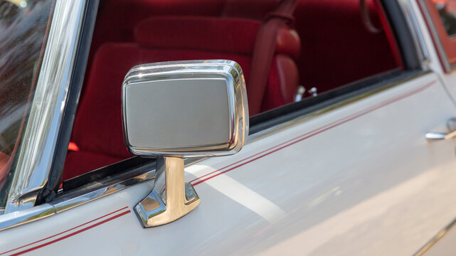Vintage and antique car side mirror.