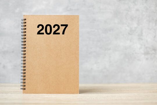 2027 Happy New Year calendar on table. countdown, Resolution, Goals, Plan,  Action and Mission Concept