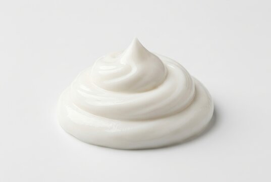 Swirl of White Cosmetic Cream or Moisturizer Isolated on Plain White Background for Skincare Beauty Concept