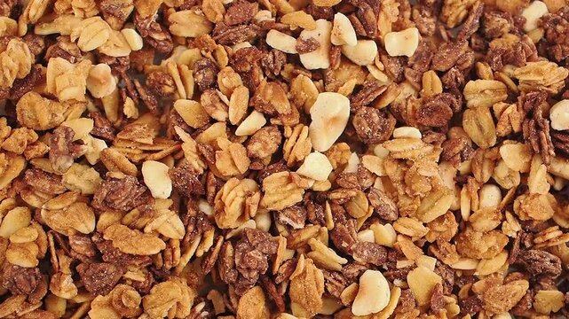 Granola preparation steps with nuts and oats in the kitchen