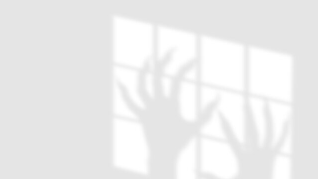 Zombie shadow hands, long claws reaching up through window