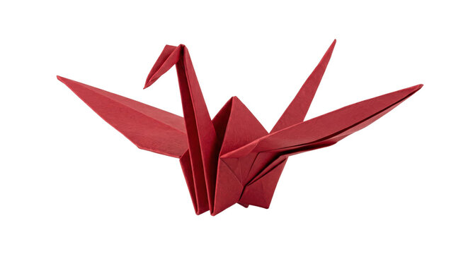 Single red origami paper crane with delicate folds stands gracefully against a clean white background