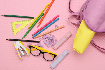 School stationery and accessories for elementary school on a pink background. Back to school concept. © splitov27