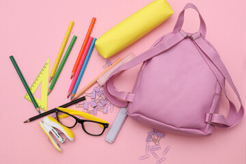 School stationery and accessories for elementary school on a pink background. Back to school concept. © splitov27