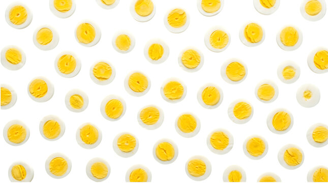 Many halves of boiled eggs arranged in a pattern isolated on transparent background