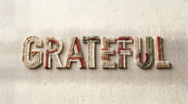 Grateful lettering handcrafted from woven Thanksgiving textiles