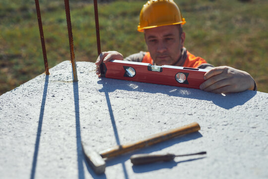 Construction worker working outdoors on a construction site.