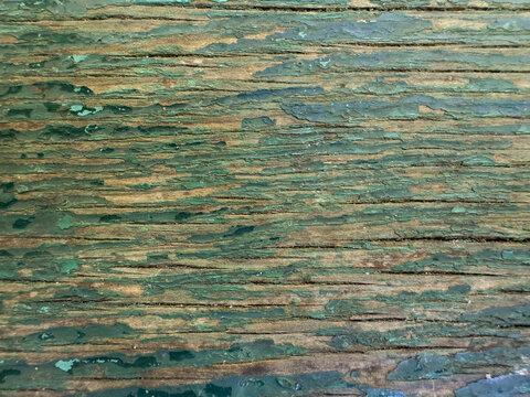 Close-up texture of an old weathered wooden table