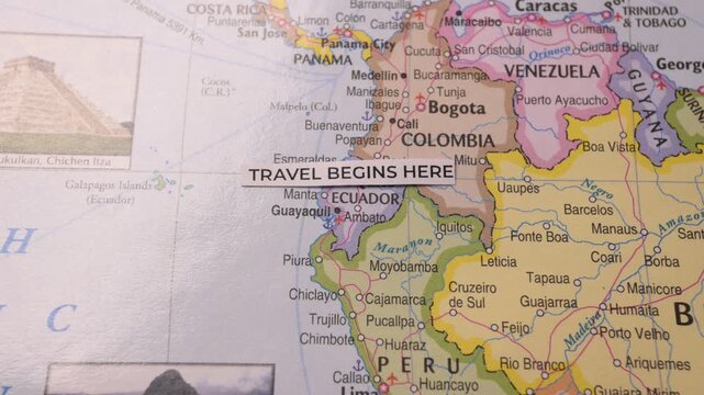 Travel Begins Here Text Label Placed on South America World Map