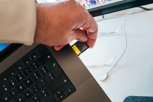 Laptop memory card slot inserting SD card data storage