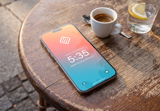 Modern Smartphones on a Cafe Terrace Table Mockup
