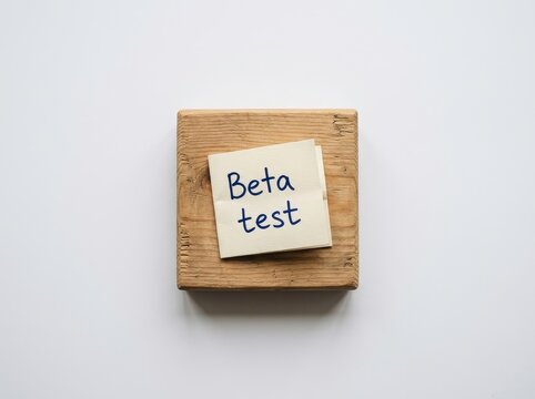 Wooden block with beta test note top down view