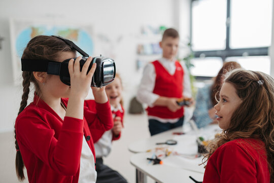 Primary school students exploring virtual reality during technology class.