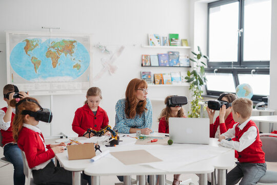 Primary school students exploring virtual reality during technology class.