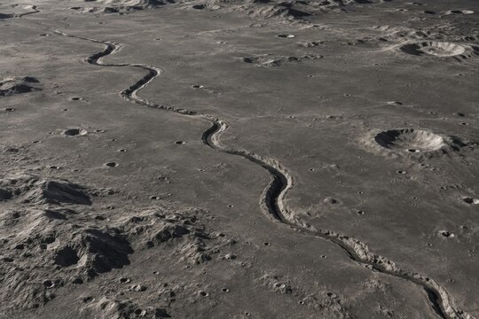 Sinuous lunar rille winds across a broad ancient plain