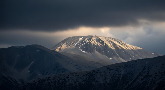 Mytikas Peak Mount Olympus with Storm Clouds Gathering at Dusk