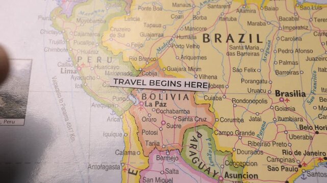 Travel Begins Here Text Tag Placed on South America Map