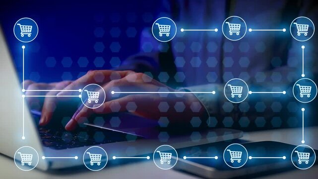 A person is using a laptop for online shopping. Shopping cart icons appear around the screen. The scene takes place in a dimly lit room. It shows the activity of browsing and selecting items.