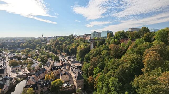 Luxembourg City panning shot over Grund valley and Petrusse gorge
