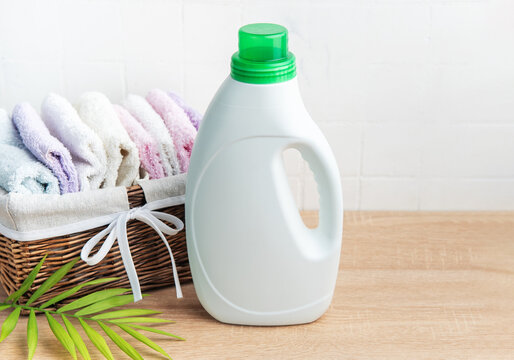 Laundry detergent bottle with fresh clean towels
