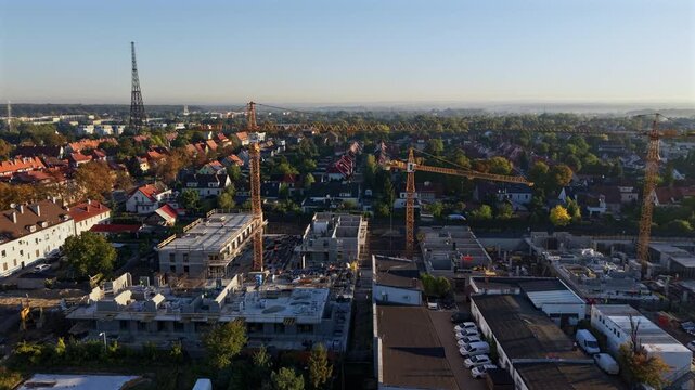 Aerial View of Construction Site and Tower Cranes in Gliwice
