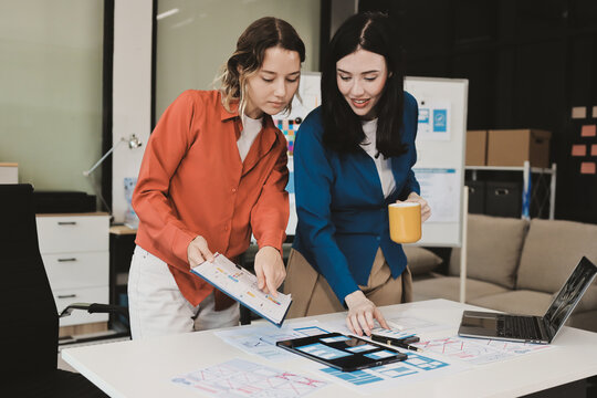 team of UI UX web designer are working together to develop mobile responsive websites with UI UX front end designer previews