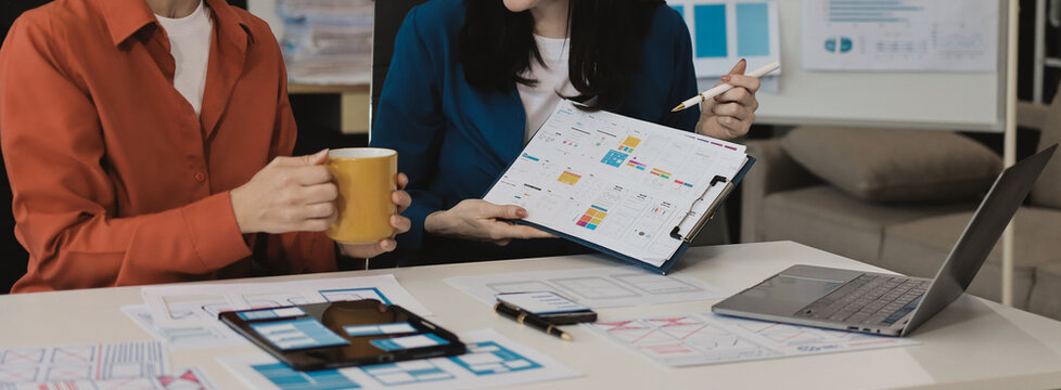 team of UI UX web designer are working together to develop mobile responsive websites with UI UX front end designer previews