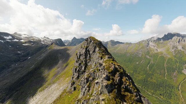 FPV flight along knife-edge mountain ridge, Sunnm&oslash;re Alps