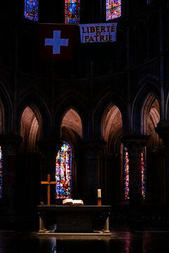 Bible illuminated by a ray of light inside a cathedral
