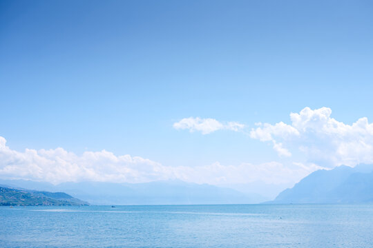 Panorama view of Lake Geneva with blue sky and clouds
