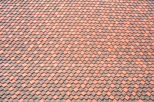 Detail of typical wooden tiles on Swiss rooftops