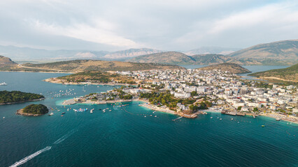 Obraz premium Aerial View of Ksamil Coastal Town Bays Islands and Mountains